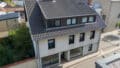 Vielseitiges Wohn-/Geschäftshaus in Wallerfangen